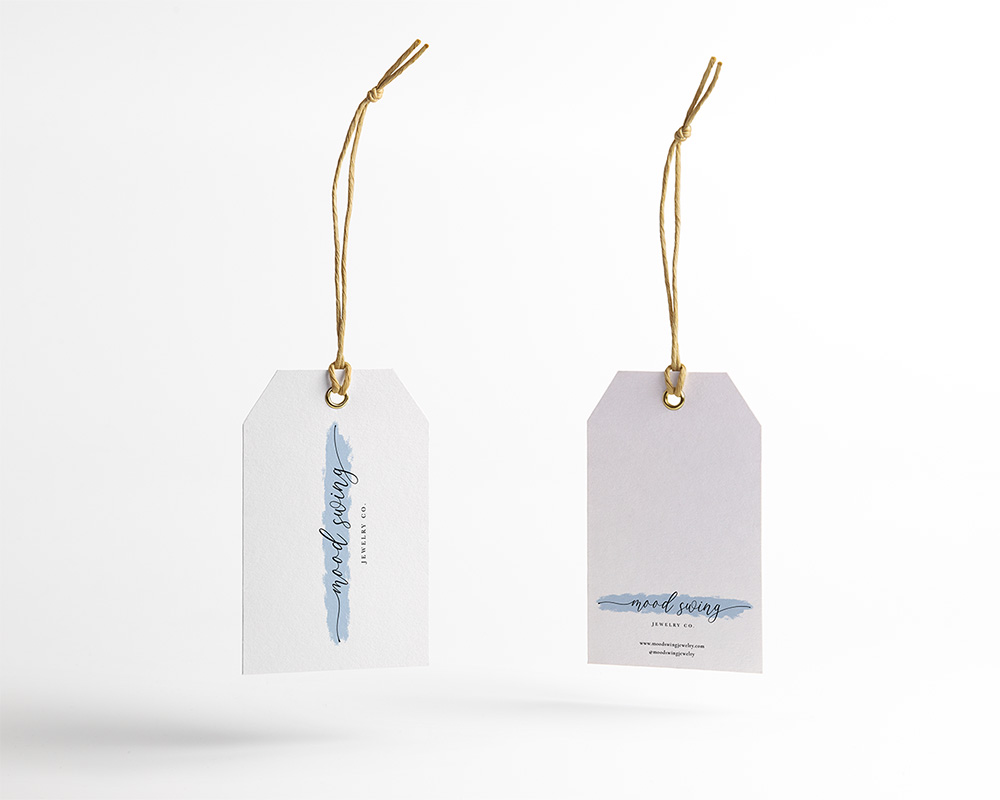 moodswing logo mockup on a jewelry tag